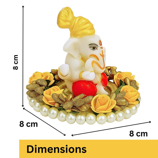 Tiny Shiny Lord Ganesha Idol on Decorative Flower Plate with Pearl Beads