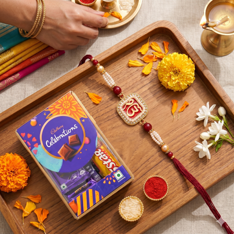Rakhi Gift Set Brother with Ik Onkar Designer Rakhi, Roli Chawa, Sipra, Key Chain and chocolate box