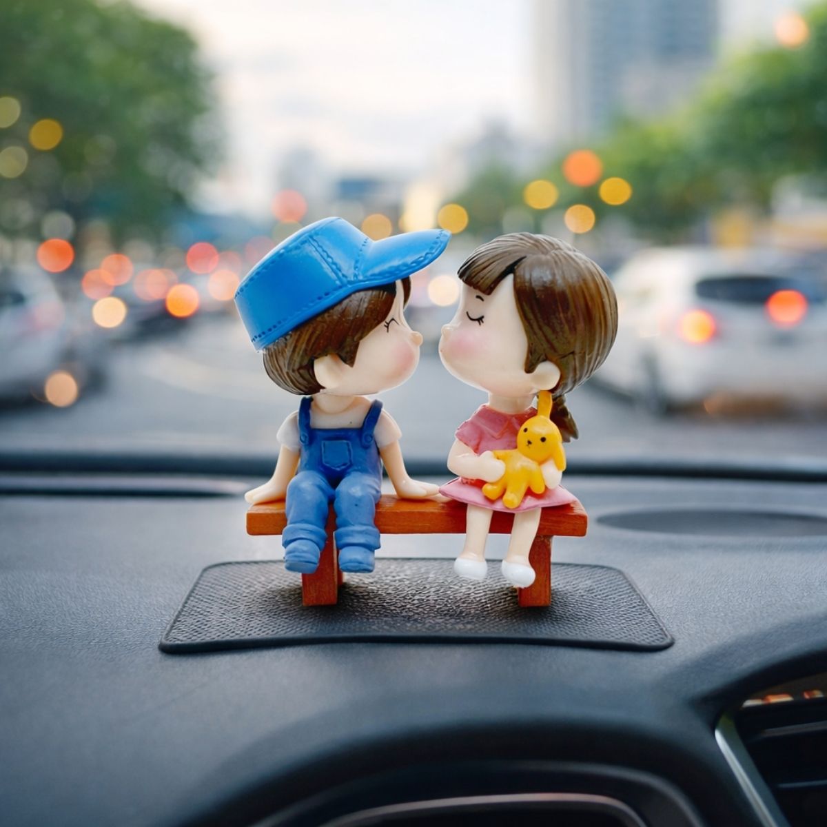 Kissing Couple on Bench Resin Showpiece