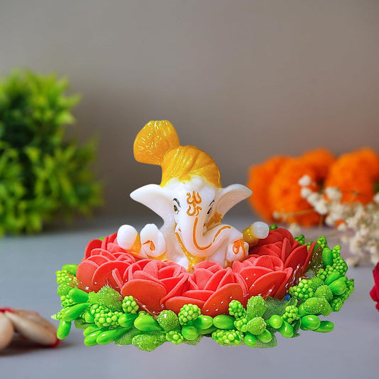 Tiny Shiny Lord Ganesha Idol on Red Rose and Green  Flower Decorative Plate