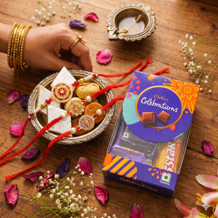 Rakhi Gift Set for Bhai with 3 Krishna Ganesha Rakhi Set, Roli Chawa, Sipra, Key Chain and chocolate box