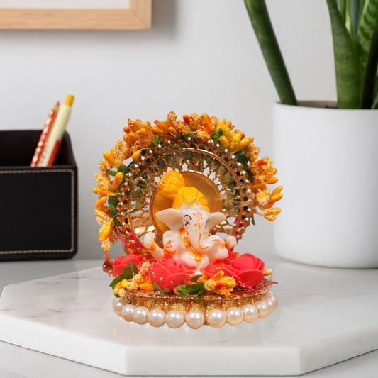 Tiny Shiny Lord Ganesha Idol with Golden Circular  Arch and Pearl Bead Plate