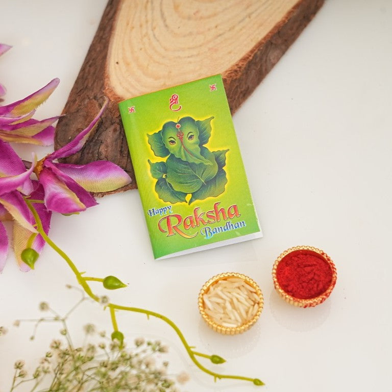 Rakhi Gift Set for Bhai with 3 Royal Peacock Rakhi Trio, Roli Chawa, Sipra, Key Chain and chocolate box