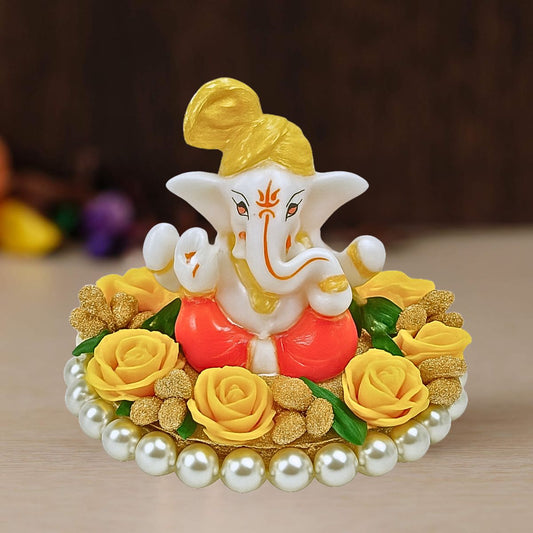 Tiny Shiny Lord Ganesha Idol on Decorative Flower  Plate with Pearl Beads