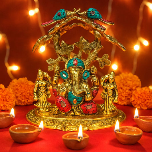 Metal Statue of Lord Ganesha Under Tree with Riddhi Siddhi